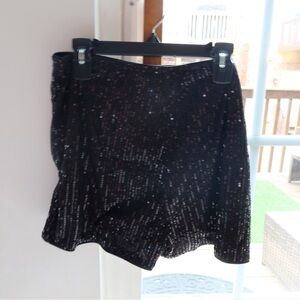 Medium sequin black shorts.  Never worn